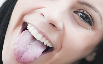 Close-up woman's tongue