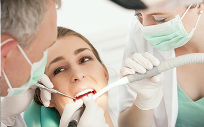 Patient with dentist having a dental treatment done