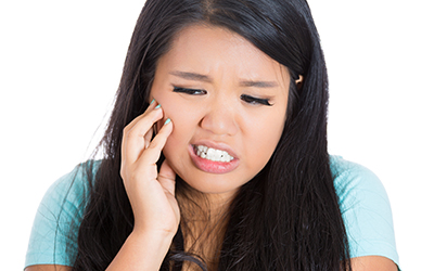 Young girl with jaw pain