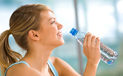 Woman with bottle of water