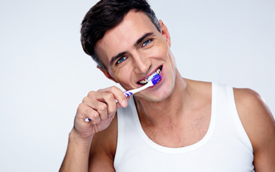 Man brushing teeth