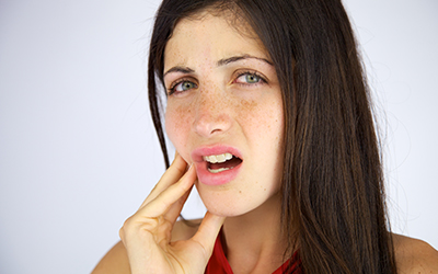 Woman with tooth pain